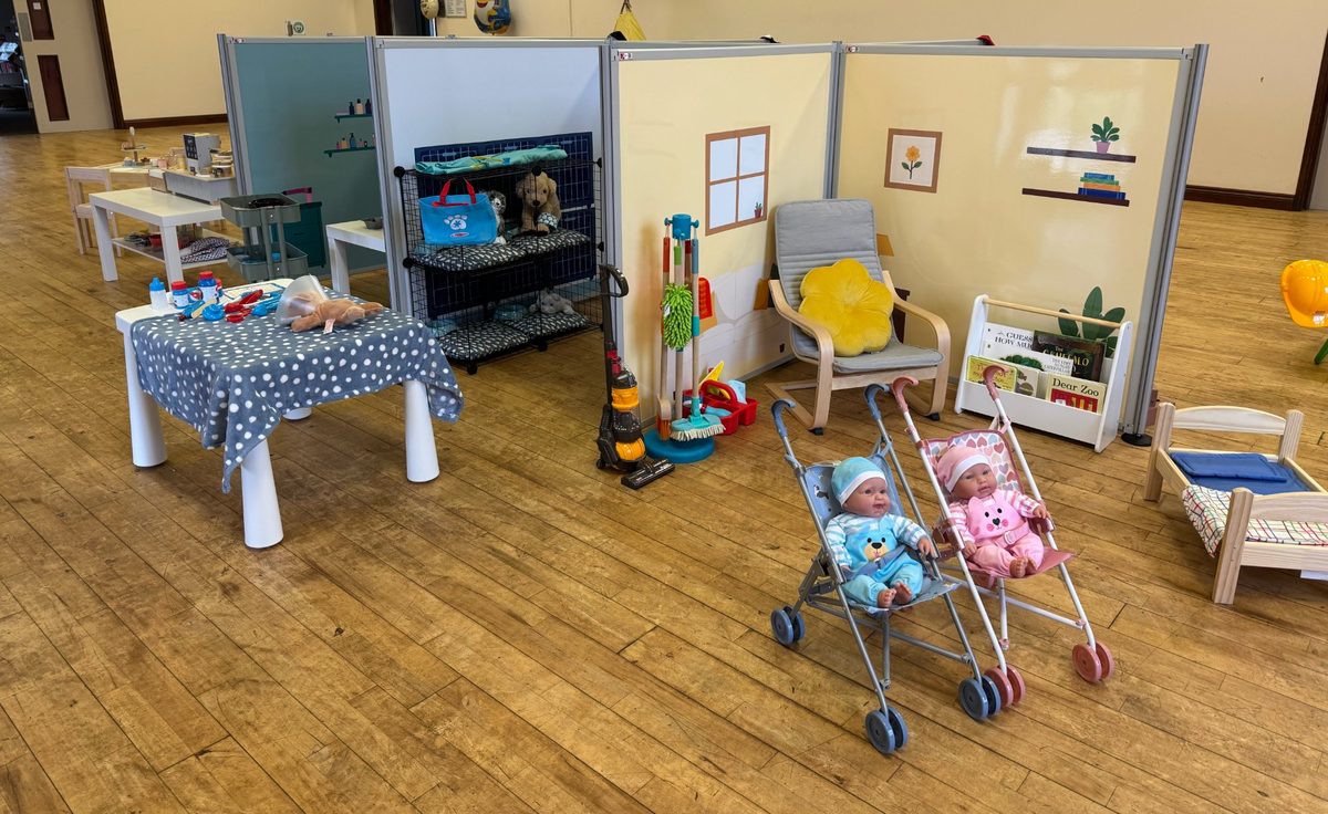 Toddler Town Stay and Play session with vets, cottage and reading corner